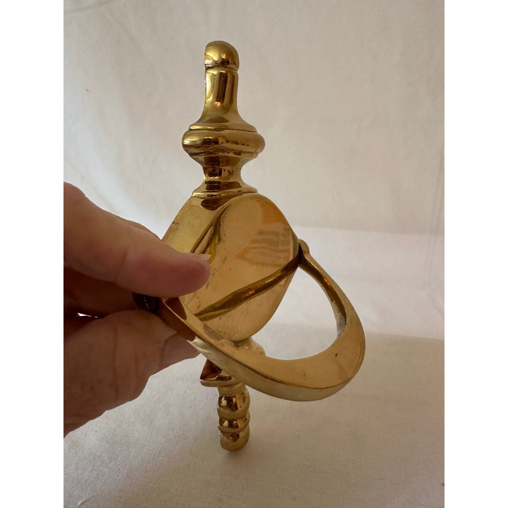 Shiny brass door knocker