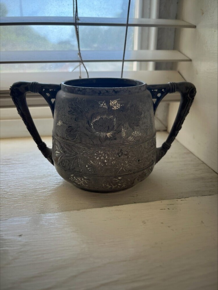 wide antique silver cup with two handles