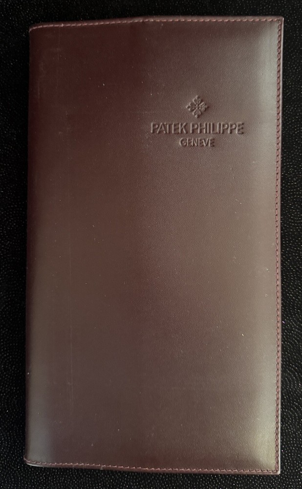 PATEK PHILIPPE LEATHER FOLDER with CERTIFICATE & MOVEMENTS BOOKLET & PAMPHLET