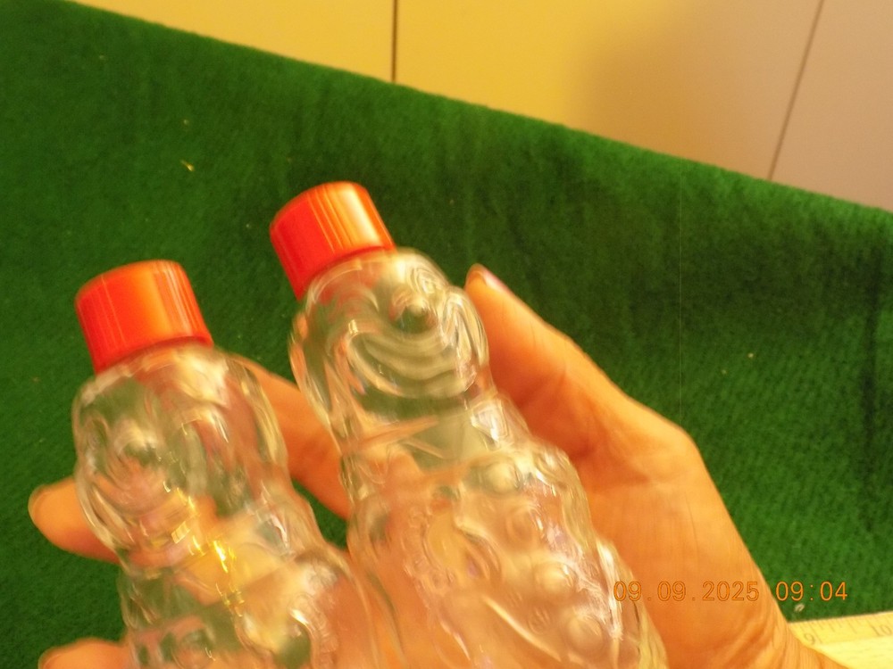 Vintage clear glass clown empty candy containers