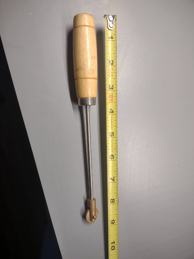 Frame wire roller tool