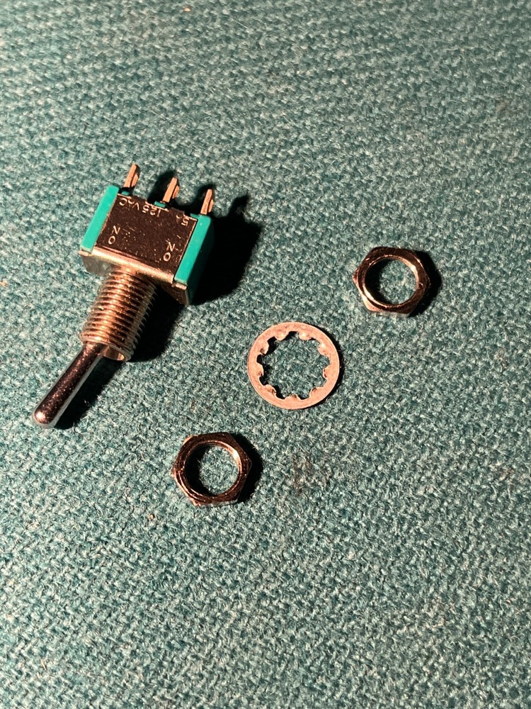 Miniature toggle switch, bat actuator, solder lugs, SPDT On-On