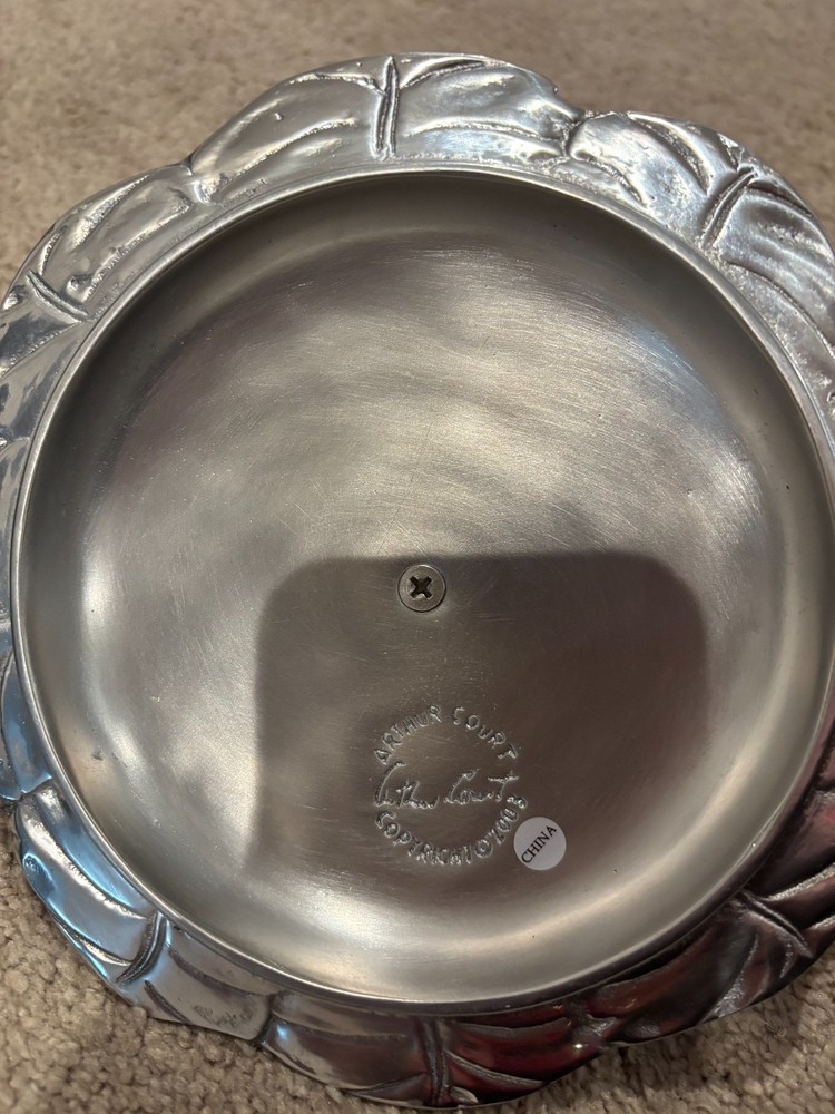 Decorative glass bowl with silver elephant handle lid