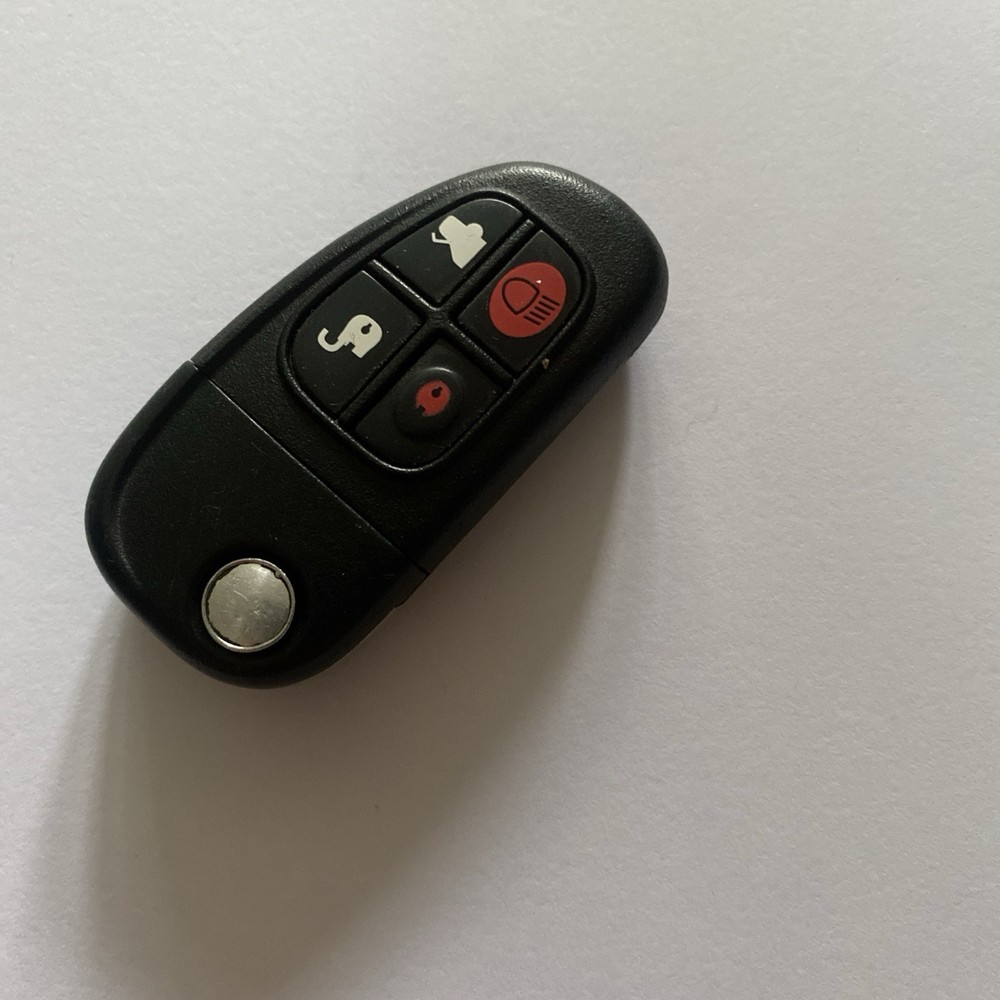 GENUINE JAGUAR 4 BUTTON REMOTE KEY FOB TESTED & UNLOCK BUTTON NOT WORKING