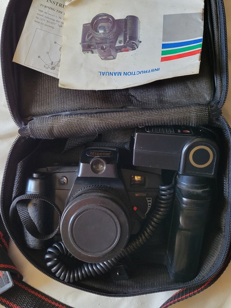 Minotar Motor Drive 35 MM Red Eye Reduction Camera W/Flash - Untested