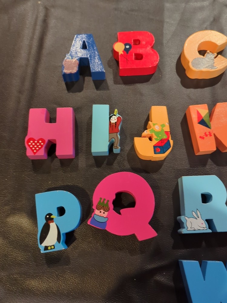 Solid wood alphabet letters in wood case