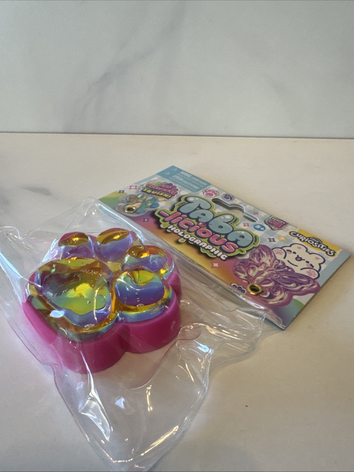 Orb Toys TABA-licious Holographic Paws Paw Print Ultimate Squish Toy Pink Gold