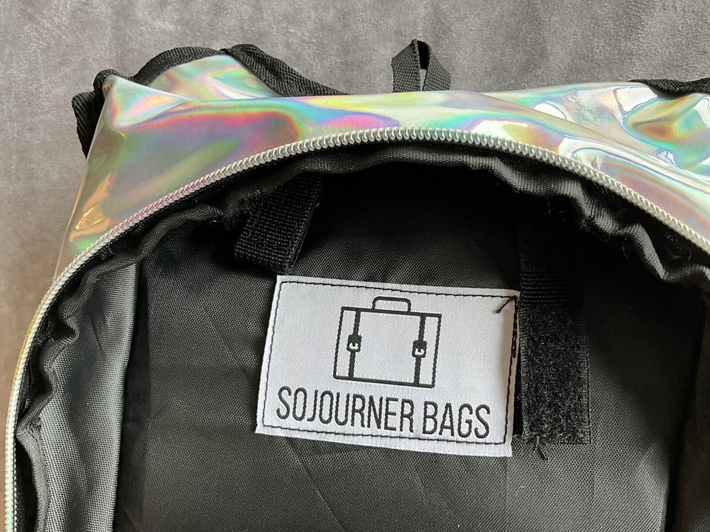 Sojourner Silver SLIM BACKPACK Pack Hiking Running Biking As Is Read