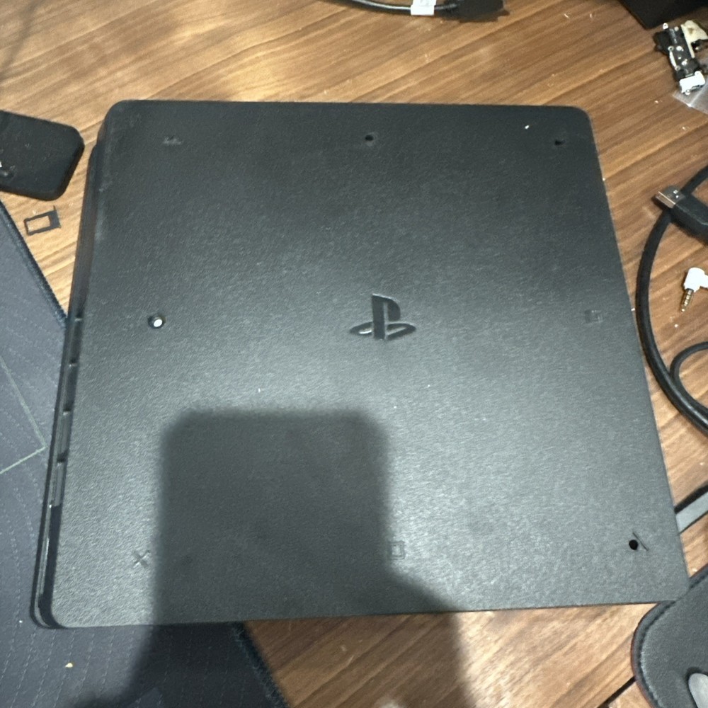 Playstation 4 Slim 2TB SSD + 4 Controllers & Charging Dock