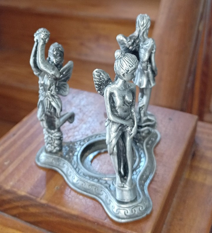 Metal 3 Character Pixie Tealight Holder.