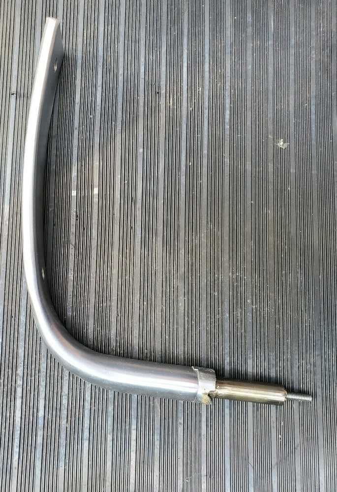 Pelton and crane chairman armrest