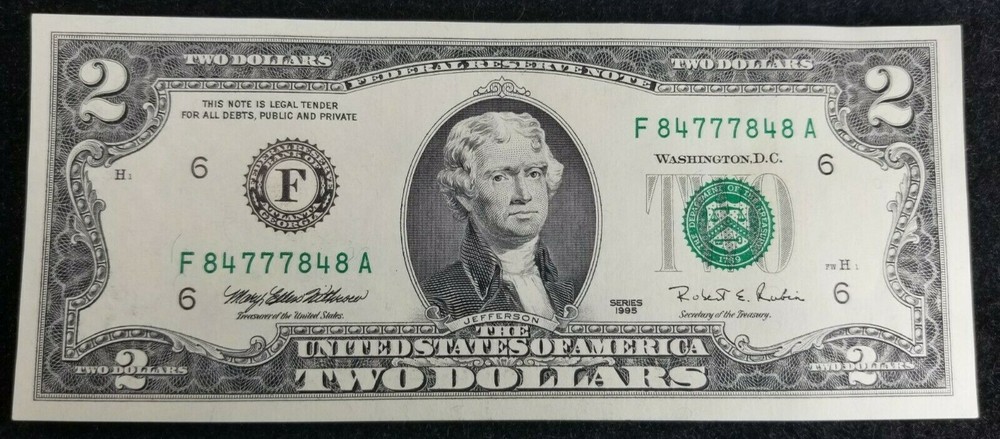 1995 $2 wet ink error note 84777848 uncirculated crisp small bookend