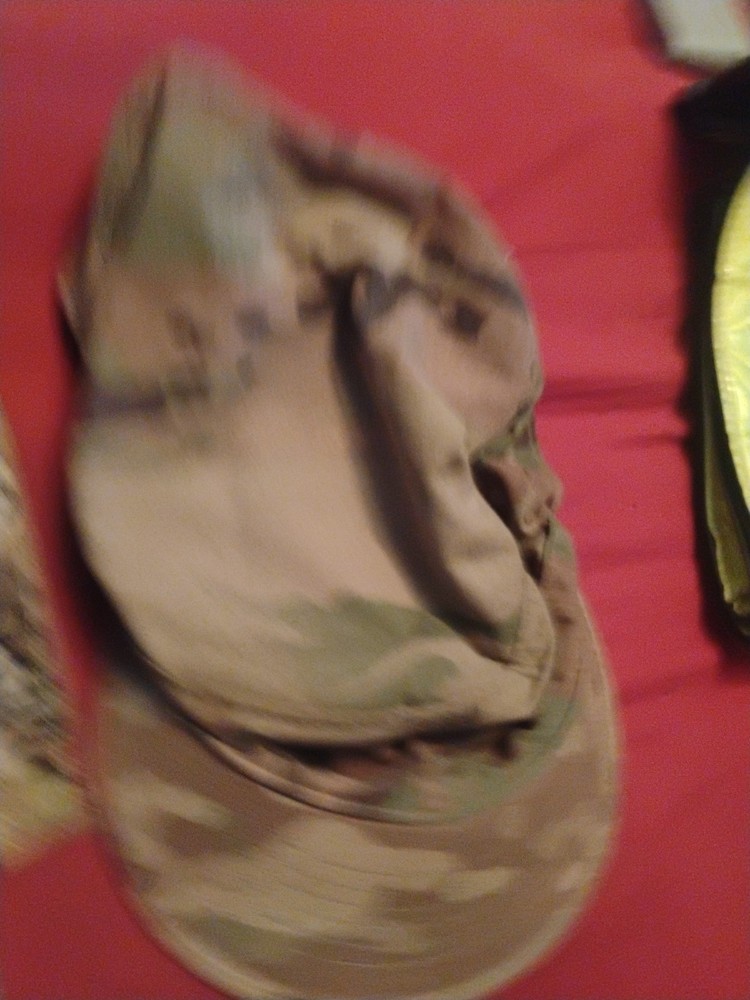 Army Patches And A Hat
