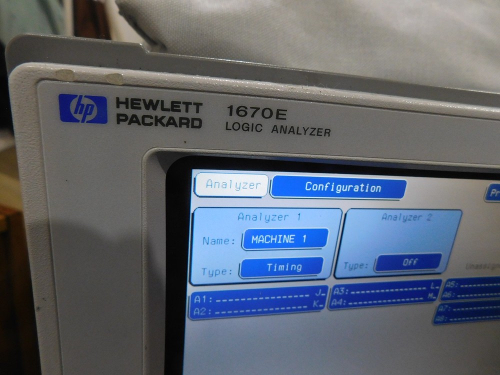 Hewlett Packard Model: 1670E Logic Analyzer with Accessories Pictured