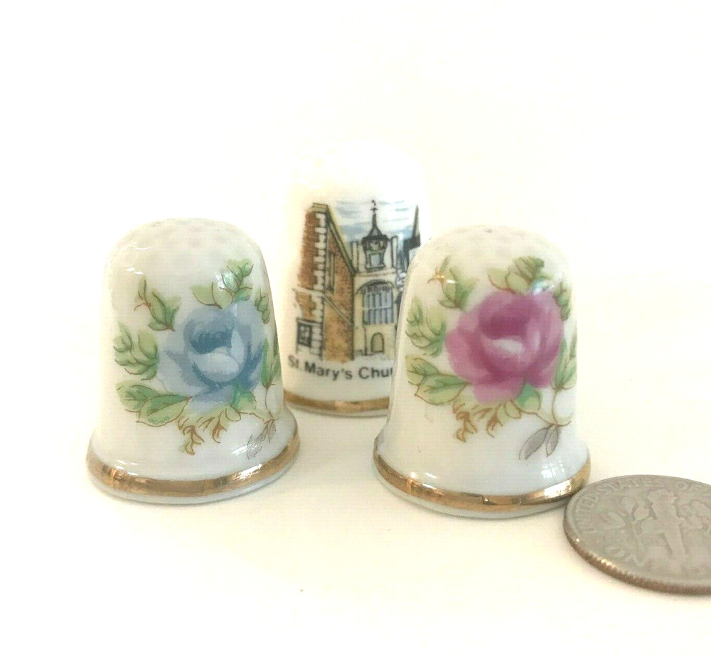 FOUR COLLECTABLE CERAMIC THIMBLES