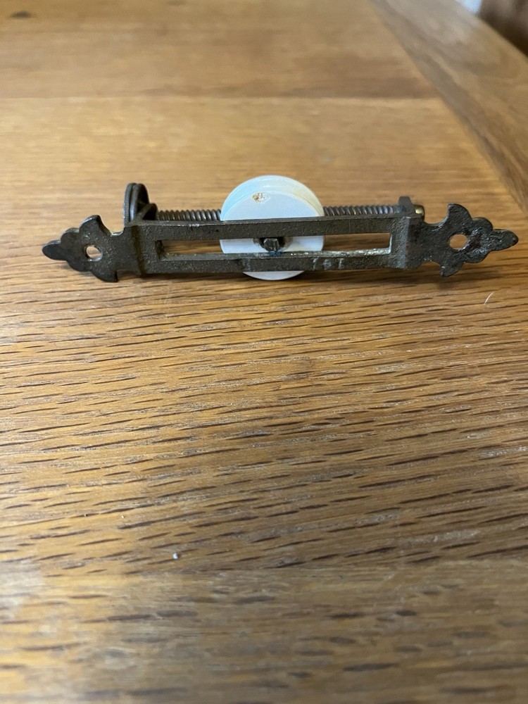 Victorian Brass & Ceramic Cord Tensioner