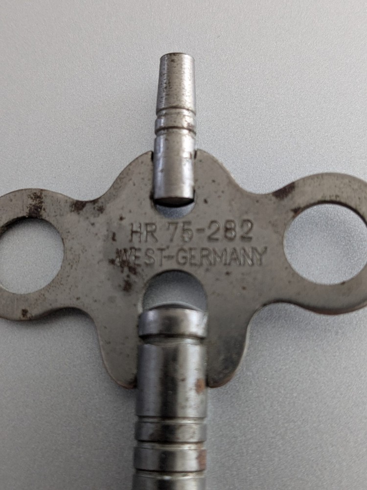 HR 75-282 West Germany Clock Winding Key Silver ton