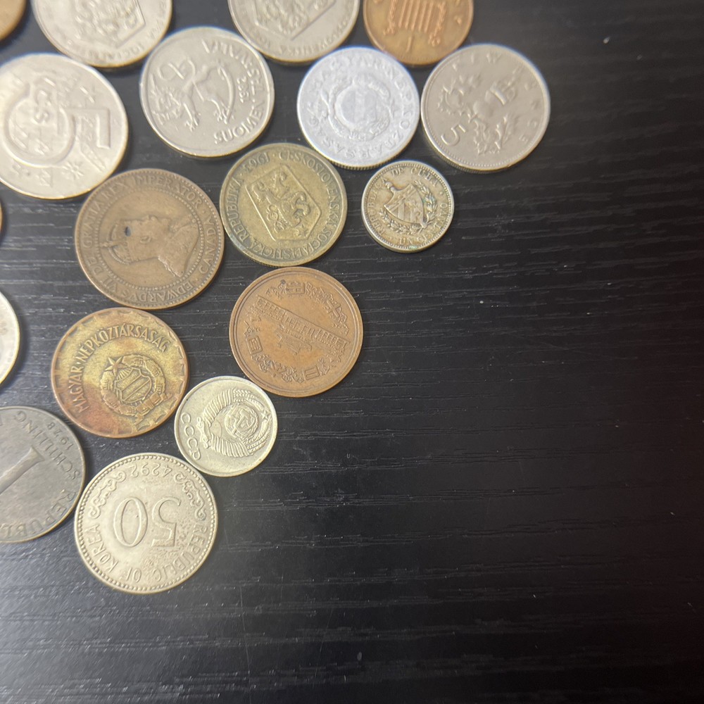 34 International Coins.