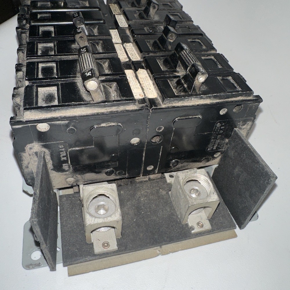 Electrical Load Center, service panel interior containing GE circuit breakers