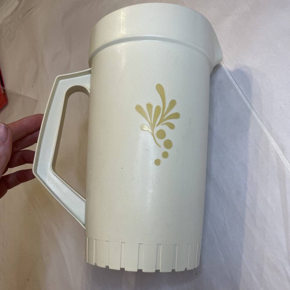 Vintage Tupperware Cream Colored Pitcher with Push Button Yellow Lid and Handle