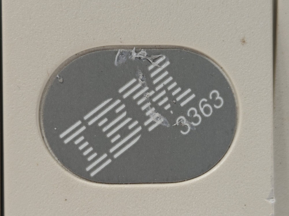 Vintage IBM 3363 optical WORM drive - chip on bezel