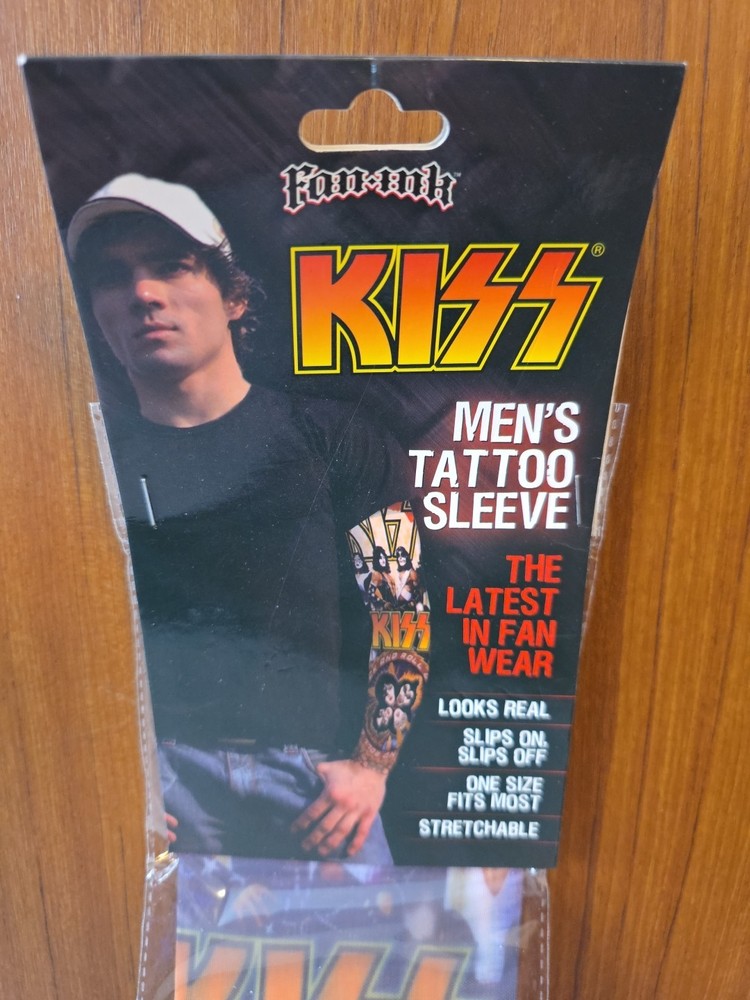 KISS TATTOO SLEEVE LOVE GUN AND ROCK AND ROLL OVER. GENE SIMMONS PAUL STANLEY