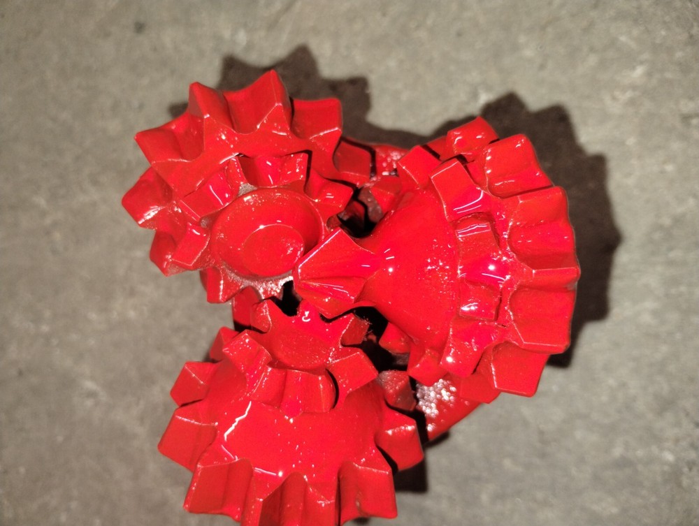 New 4 5/8" tri cone open bearing toothbit