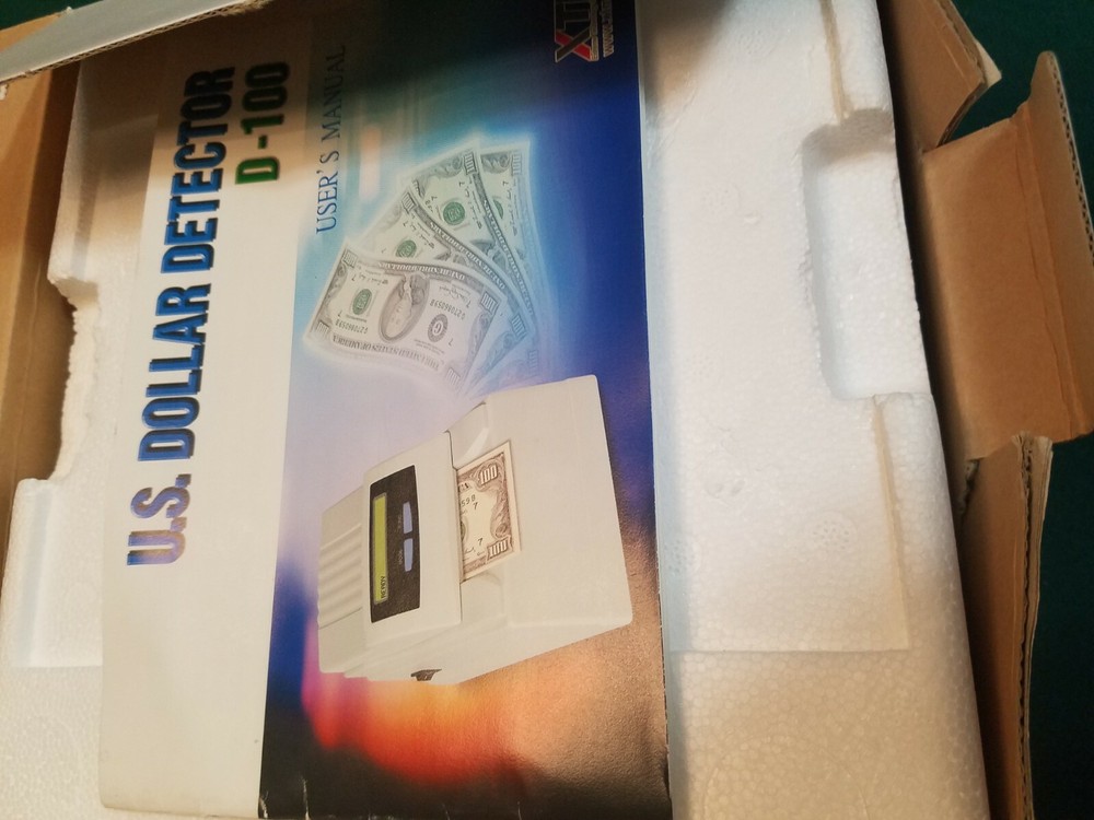 U.s. dollar counterfeit detector