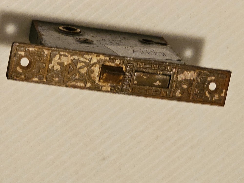 A OLD DOOR LOCK and KEY it WORKS. E