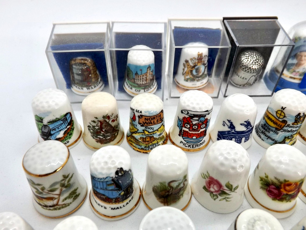 63 Thimbles Perfect Condition