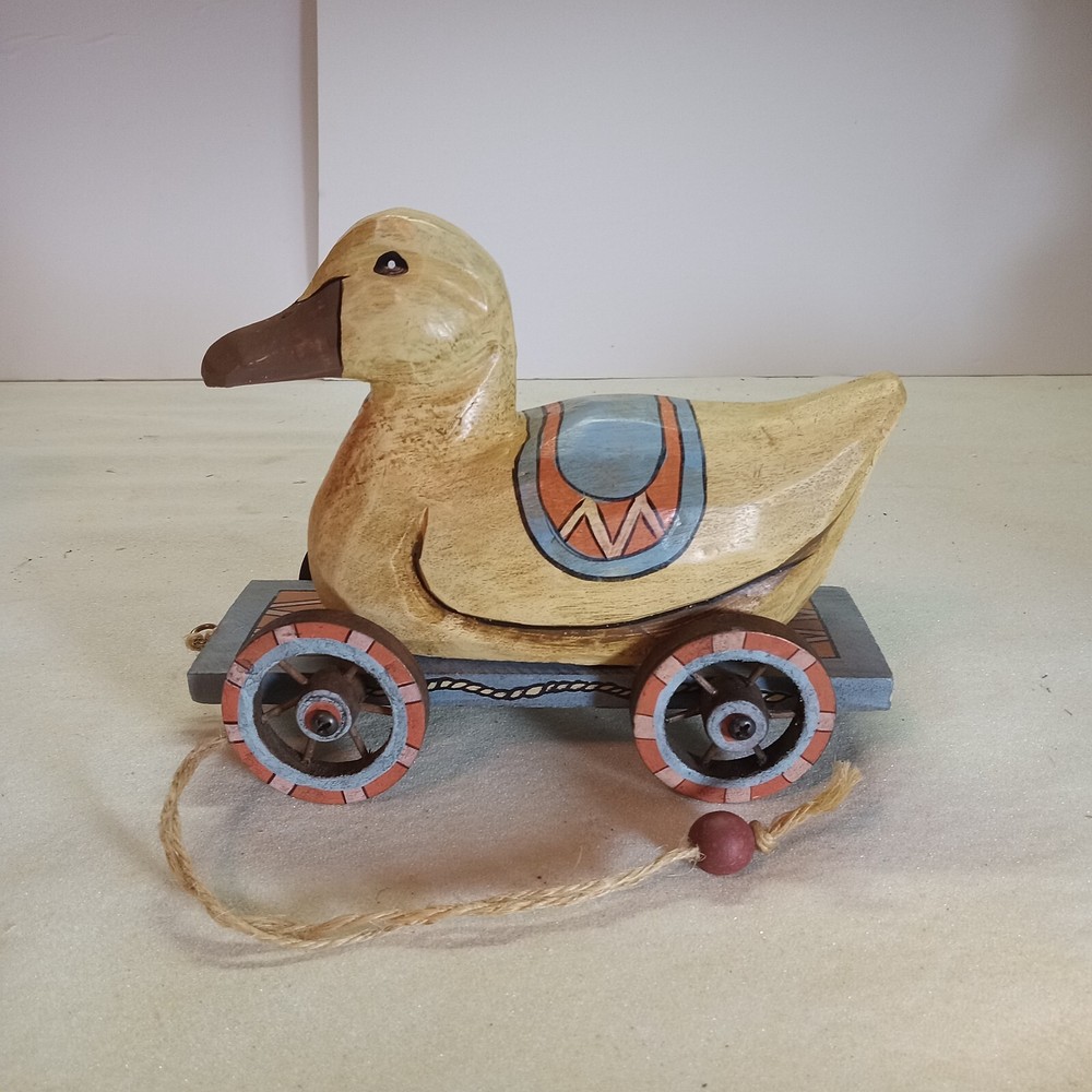 A bunny & duck on wheels pull toy