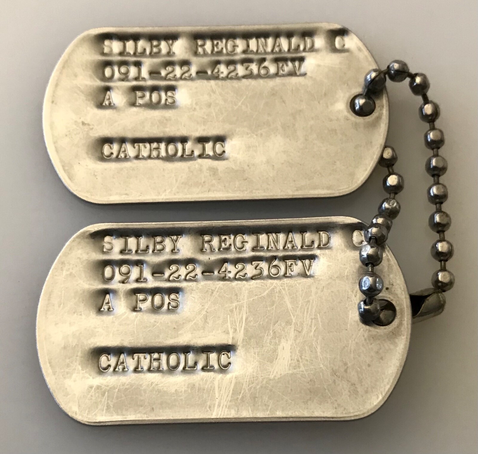 US Military DOG TAG SILBY, REGINALD C matching Pair Two dogtags Catholic Vintage