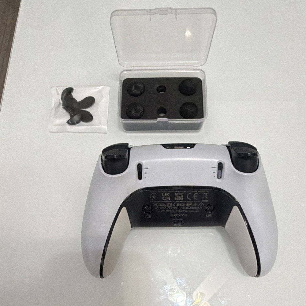 Sony DualSense Wireless Controller Bundle with Thumb Grips, Trigger Attachments…