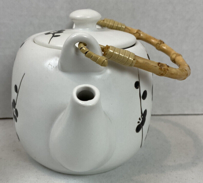 White Ceramic Teapot w Black Flowers & Two Cups Wicker Handle EUC