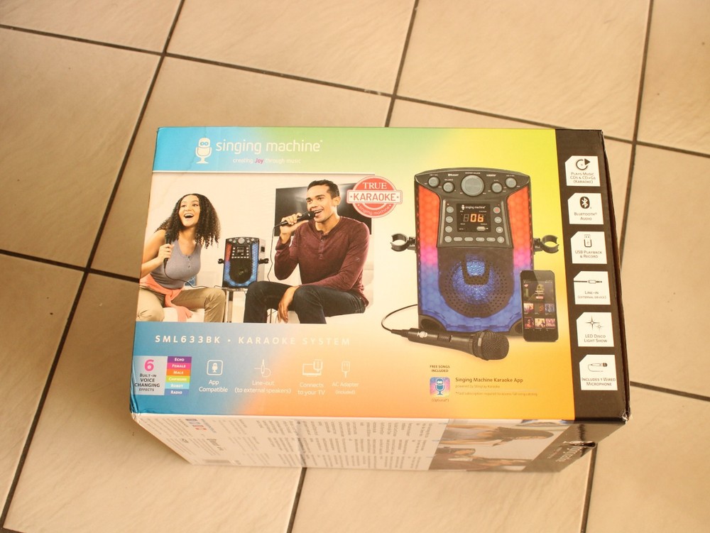 The Singing Machine Bluetooth CD+G Karaoke System, black with microphone