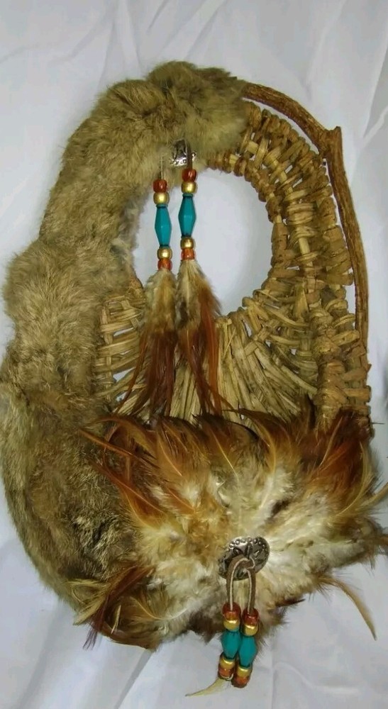 2 Indigenous Wall Pocket Baskets with Real Fur and Feathers.
