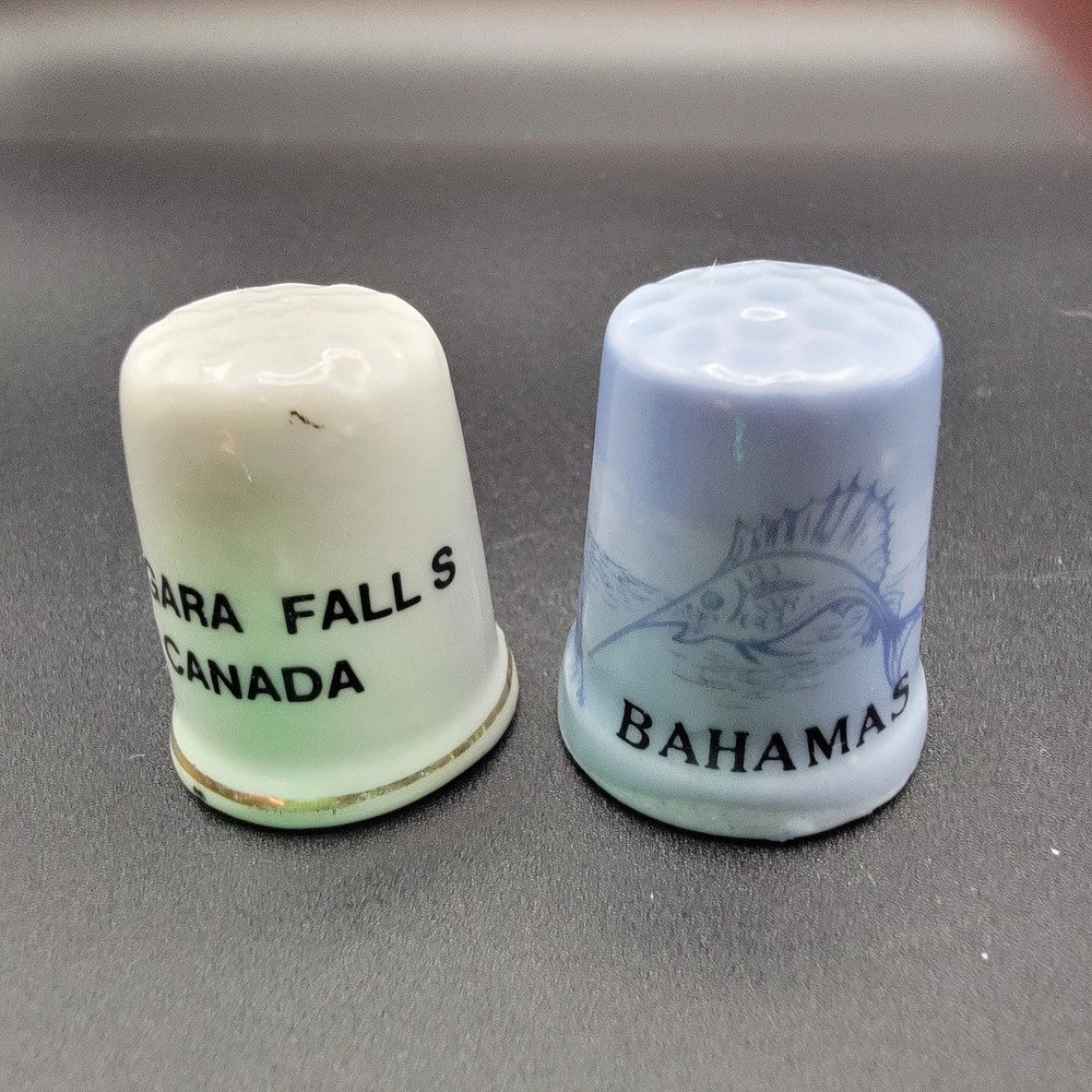 8 Collectible Thimbles From Various Destinations