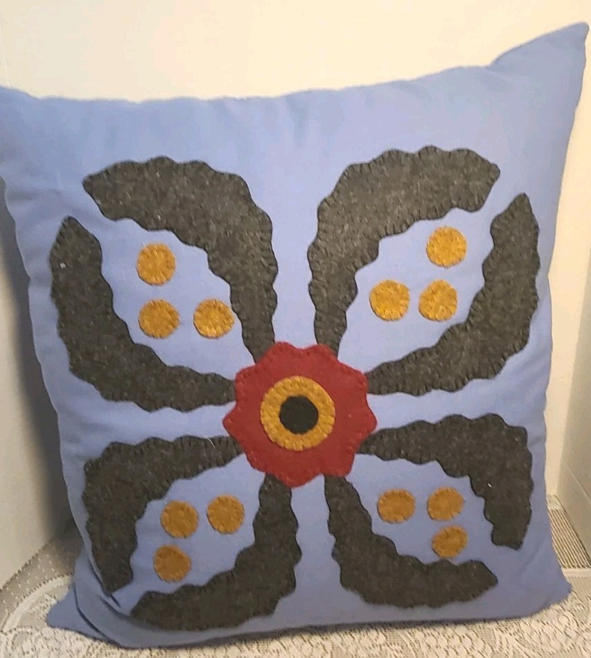 Large symmetrical floral Throw Pillow Crafted through Applique' Pattern
