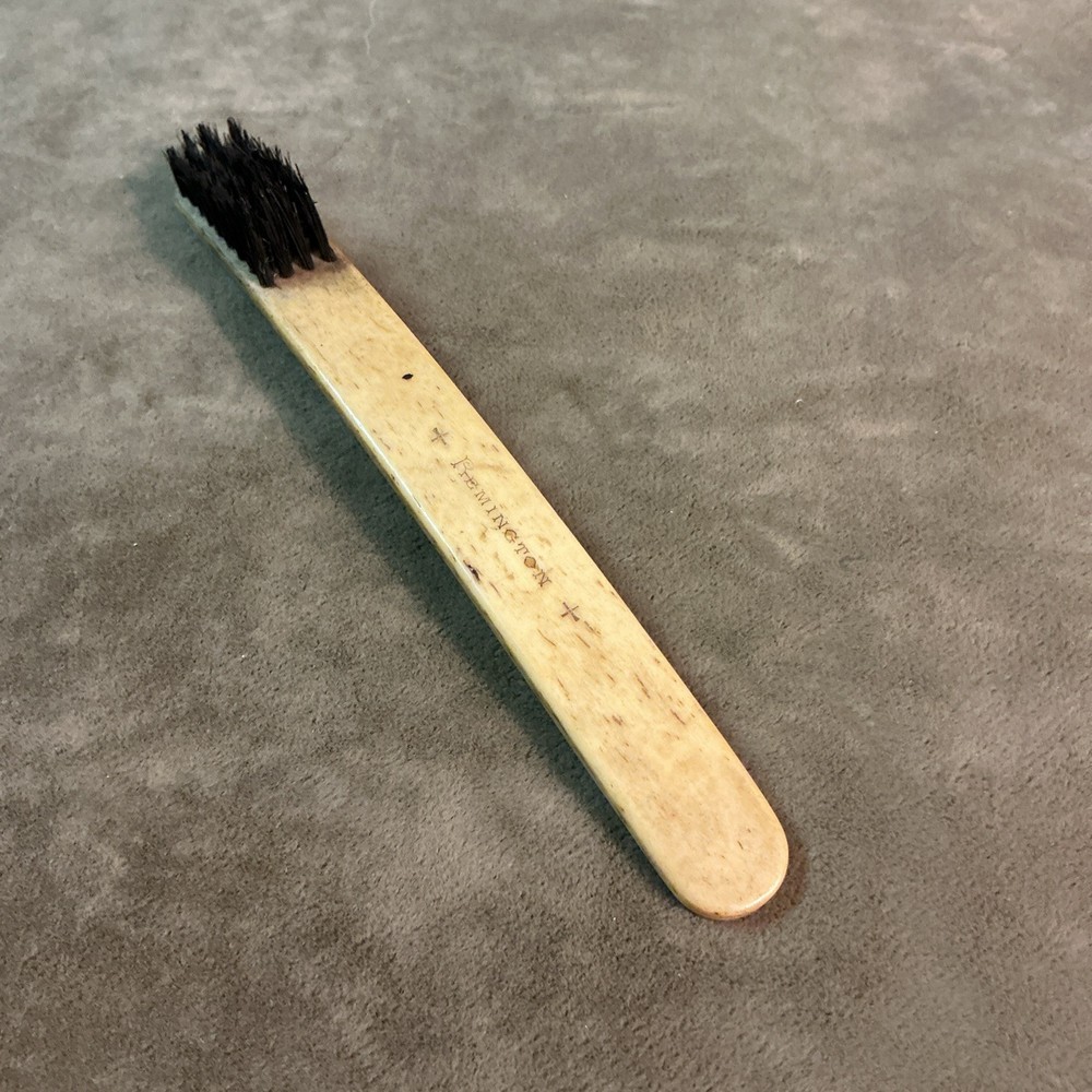 Circa 1900 bone handle Remington typewriter handheld natural bristle brush