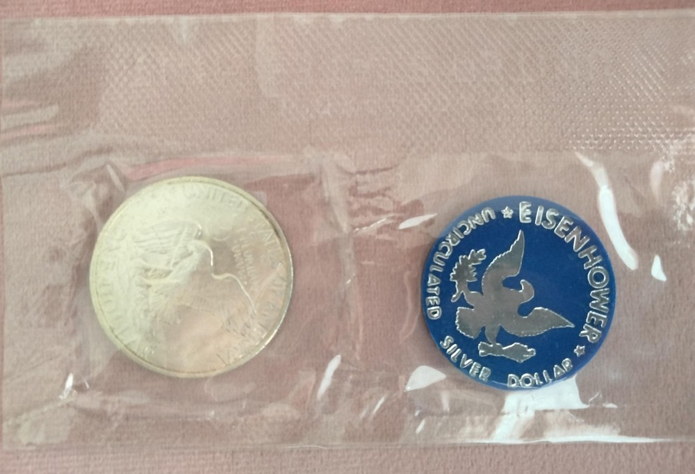 1971 Eisenhower Uncirculated Silver Dollar coin with envelope
