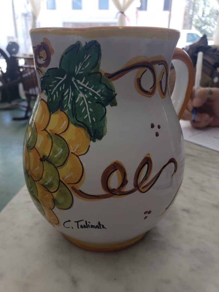 Hand painted, signed, ceramic pitcher,