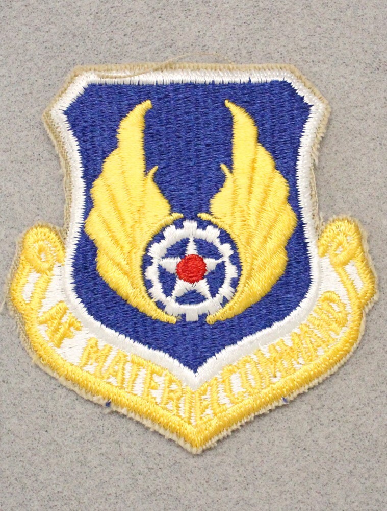 USAF Air Force Patch 106: AF Materiel Command, yellow motto - 3"