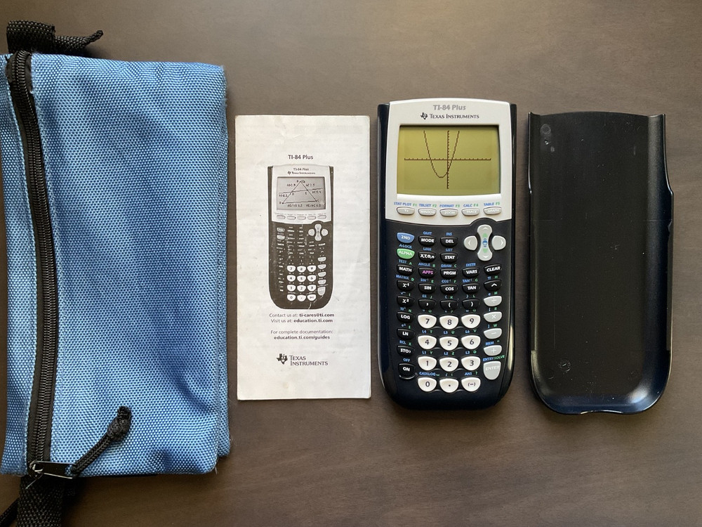 Texas Instruments TI-84 Plus Graphing Calculator Excellent Cond.