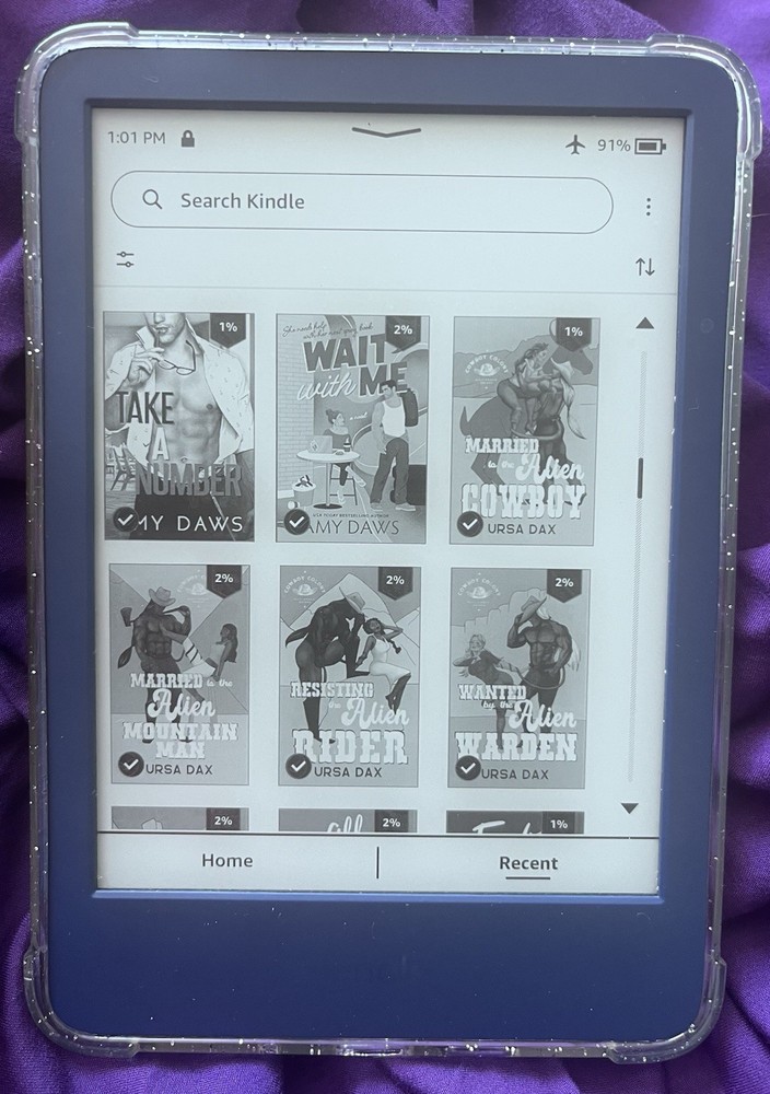 Amazon Kindle ereader Blue with books