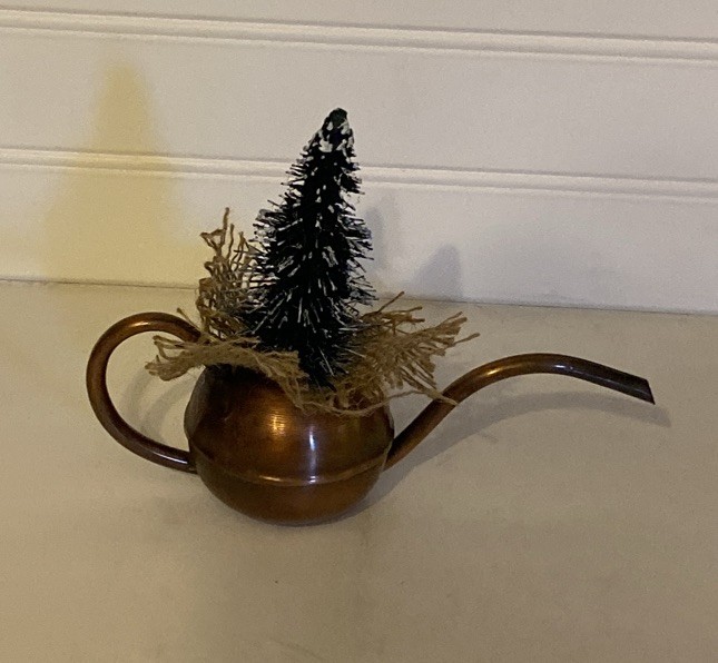 Small Flocked Green Christmas Tree In Copper Look Pot