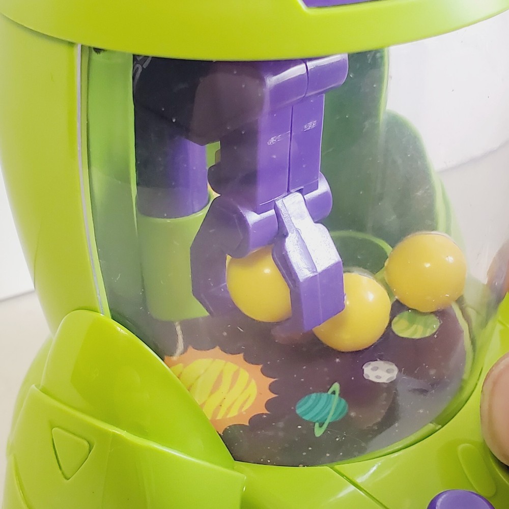 Mini Crane Game Machine. Space Rocket Ship. Handheld. W Opening Balls. ONLY 5" T