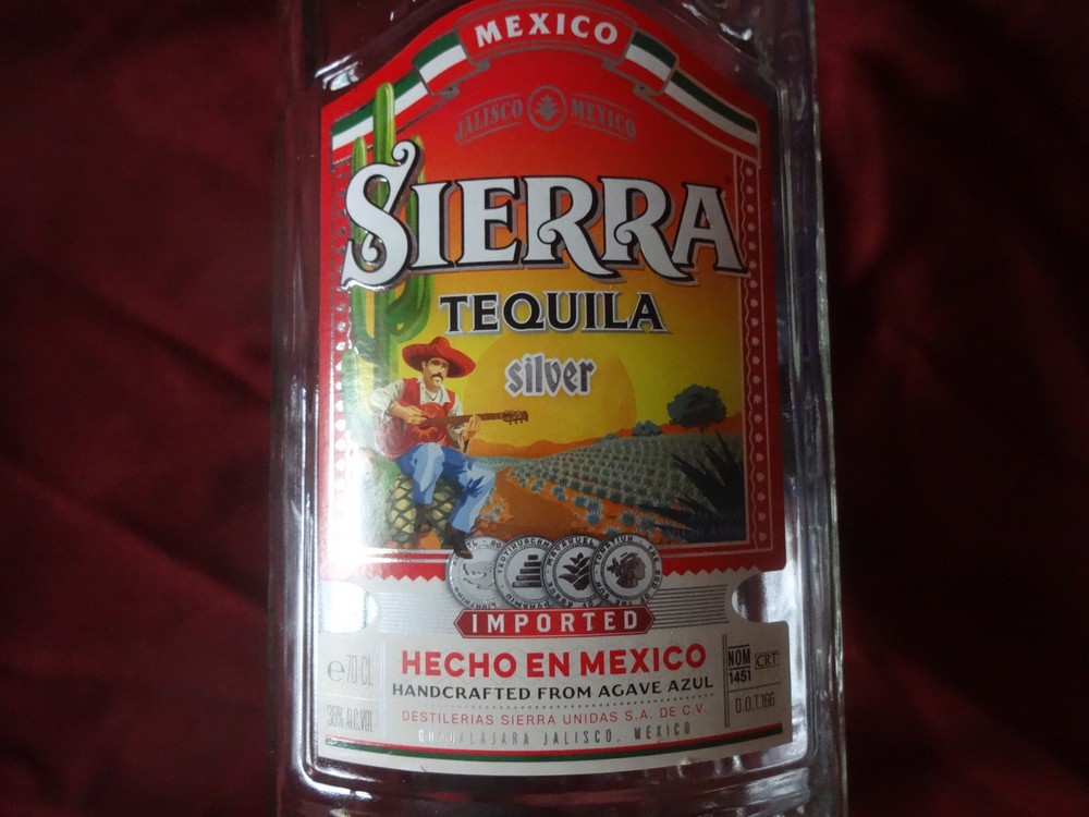 Two empty Sierra Tequila bottles- Blanco and Silver (superb condition)
