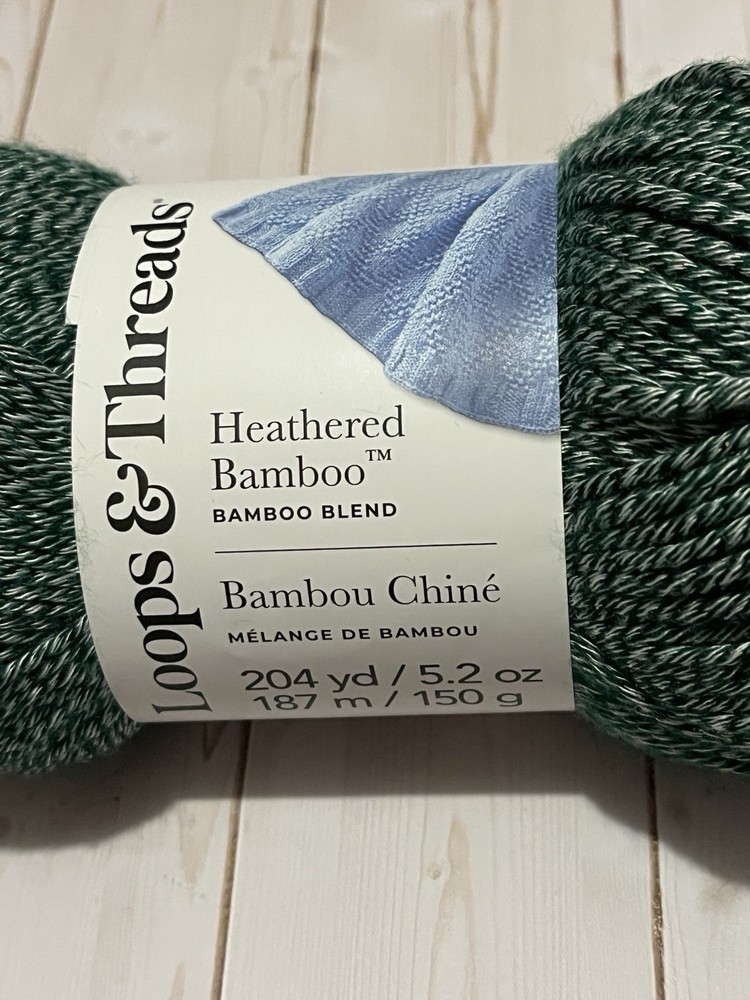 one full skein Loops & Threads Heathered Bamboo yarn Pine green