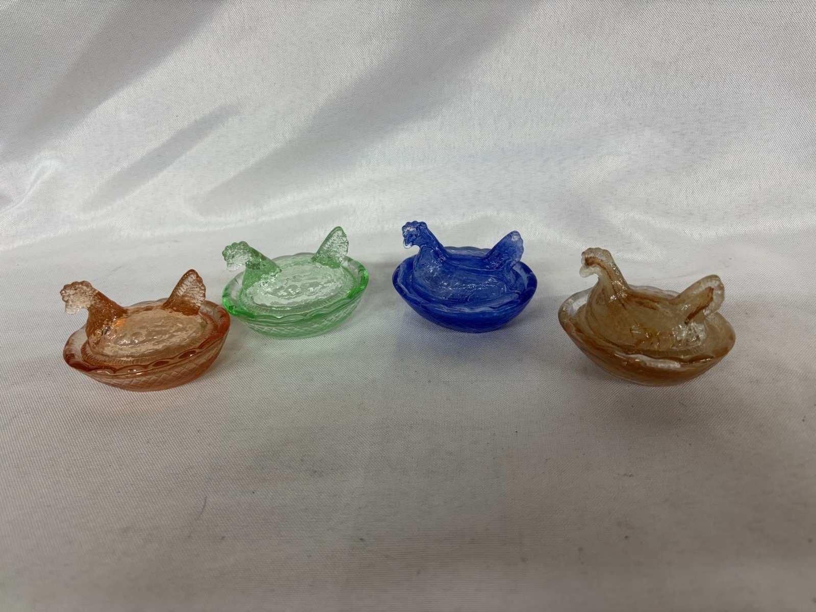 4 Mini Hens On Nest Pink , Green , Swirl Blue And Swirl Amber