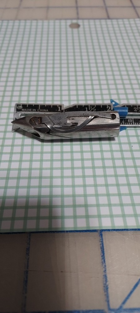 Vintage Sewing Machine Shuttle "Family"